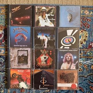 Mix collection of rock music CDs